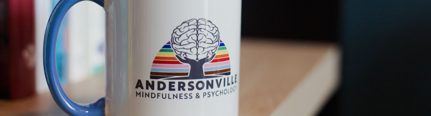 Mug with Andersonville Mindfulness & Psychology logo on it